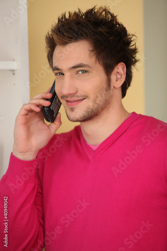 Young man talking on the phone