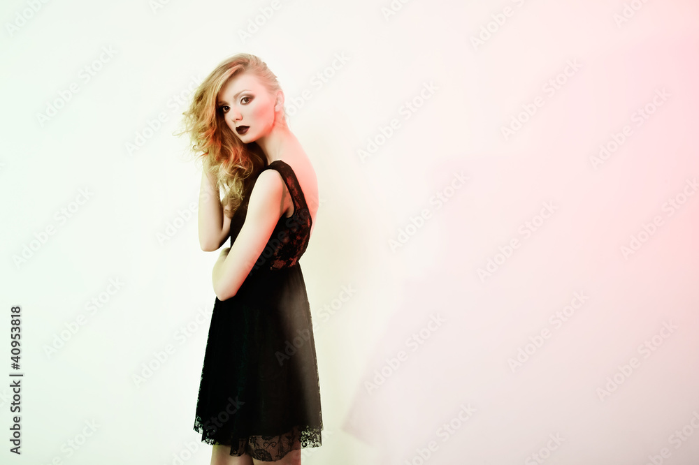 Fototapeta premium Fashionable portait of young girl. Mixed light.