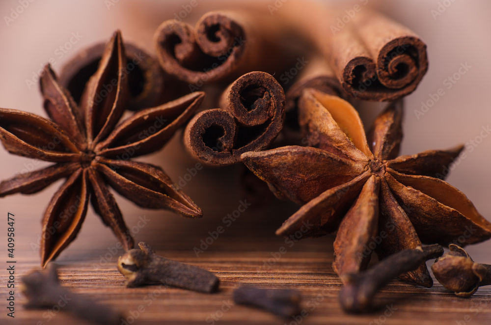 Closeup of cinnamon sticks and anise stars spices Closeup of cinnamon sticks and anise stars spices
