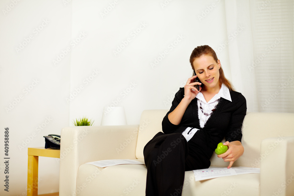 Caucasian young business woman working on sofa Caucasian young business woman working on sofa