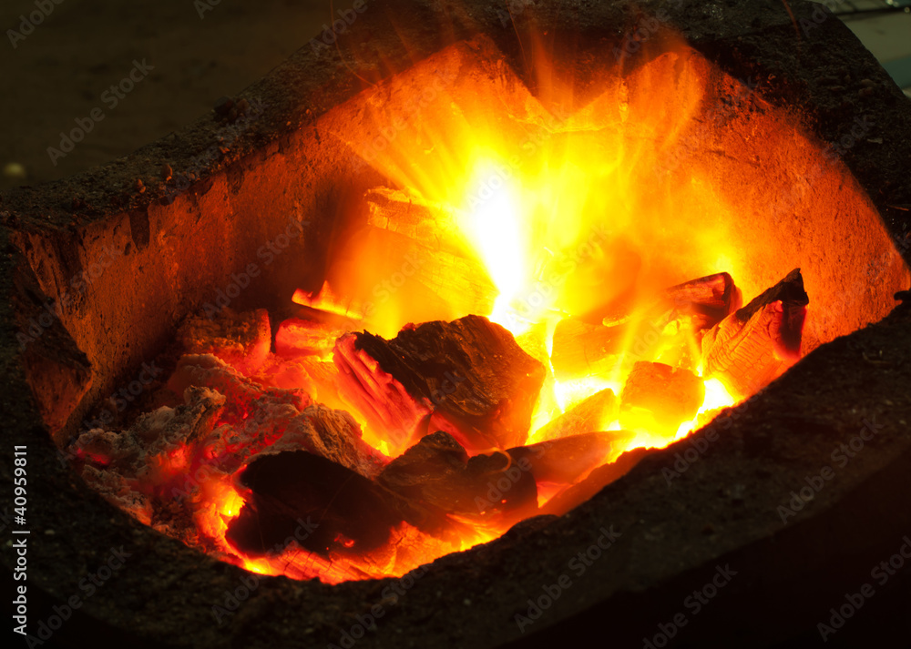 burning billets in hot stove