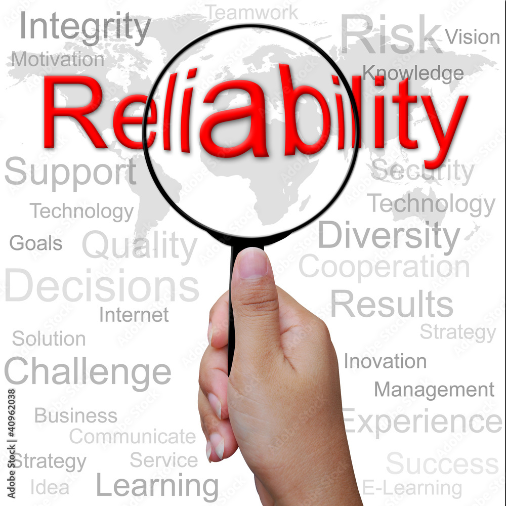 Reliability, word in Magnifying glass ,business background Reliability, word in Magnifying glass ,business background
