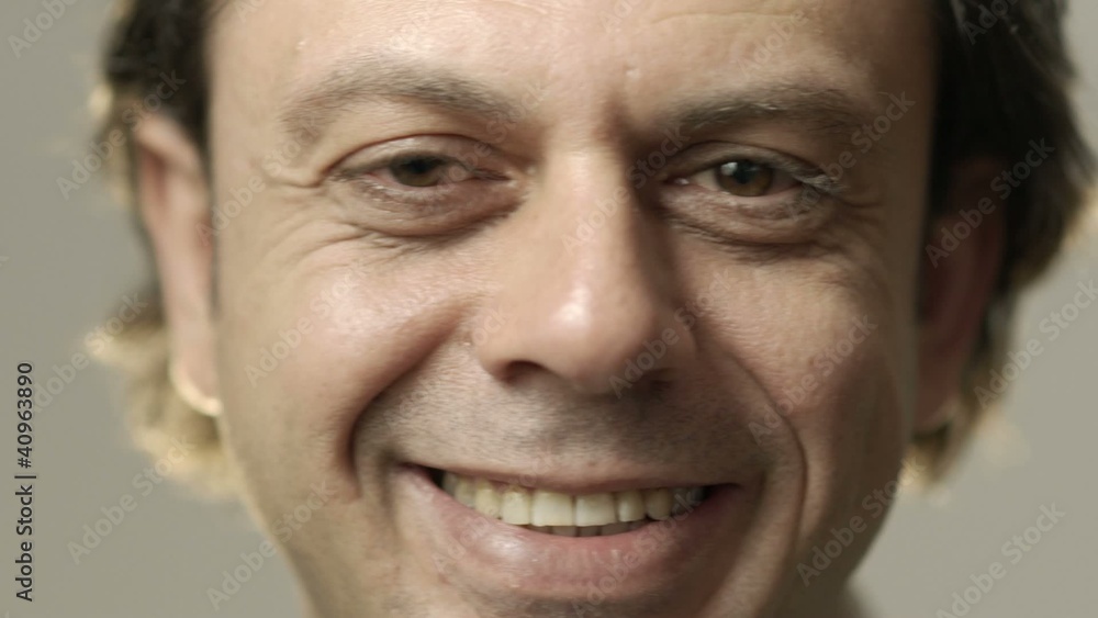 Portrait of happy caucasian adult man smiling at camera Portrait of happy caucasian adult man smiling at camera