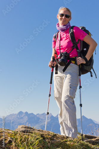 woman hiking in high mountains