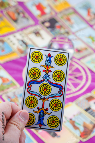 Tarot card held in the hand (1).