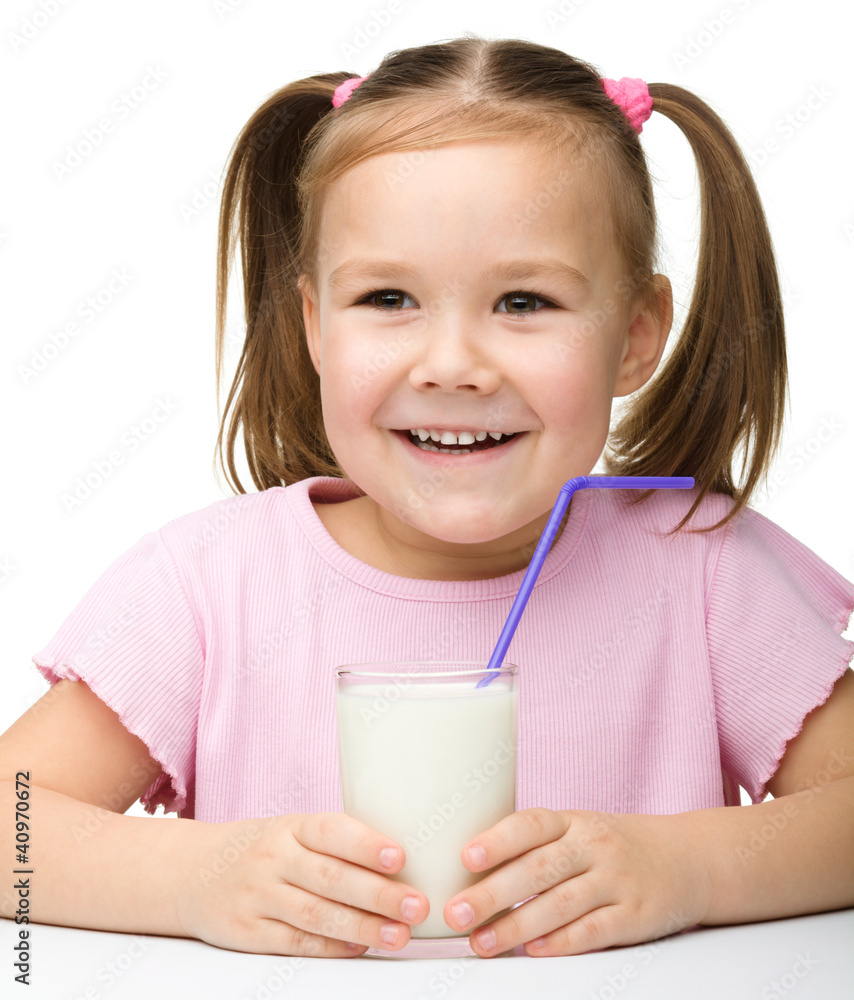 Cute little girl with a glass of milk Cute little girl with a glass of milk