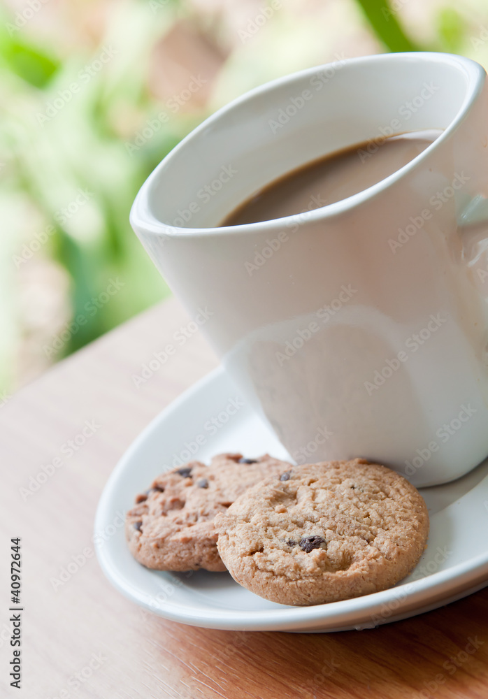 coffee cup with cookie . coffee cup with cookie .