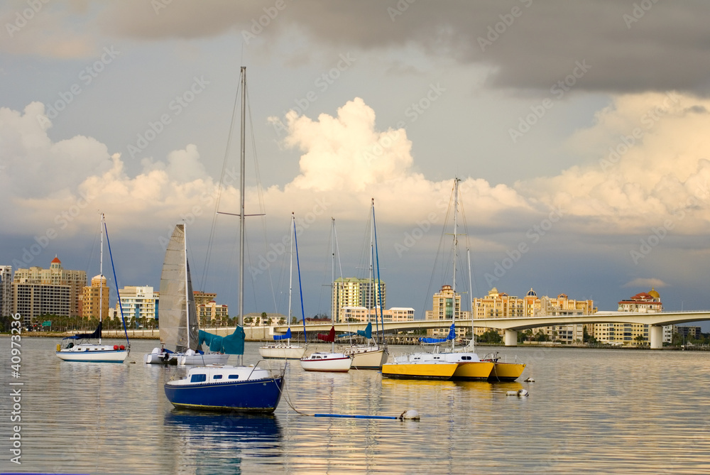 Boats in Harbor Under Cloudy Skies