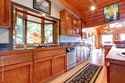 Large kitchen lof cabin house interior.