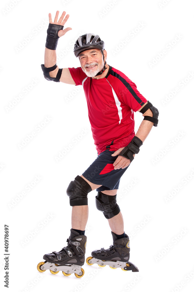 senior man inline skating senior man inline skating