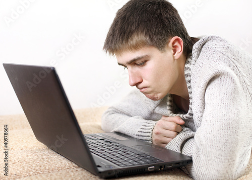 young man with notebook