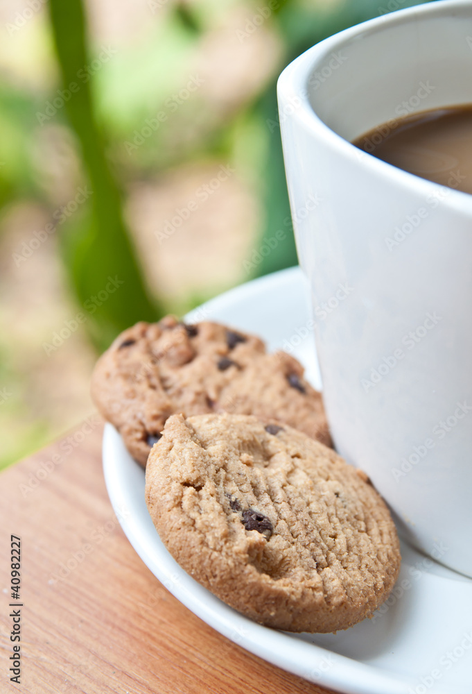 coffee cup with cookie . coffee cup with cookie .
