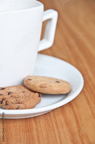 coffee cup with cookie .