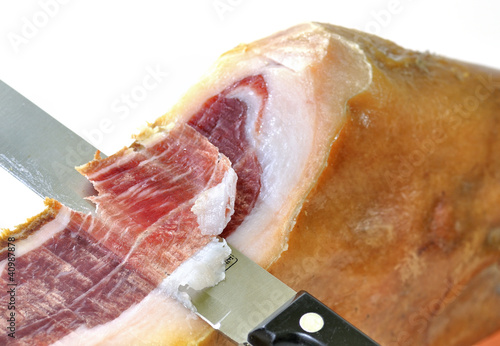 Cortando jamón serrano. photo