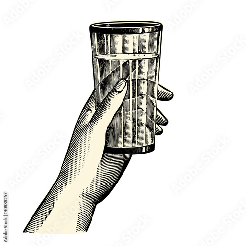 Main tenant un  verre