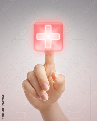 Hand pushing medical button