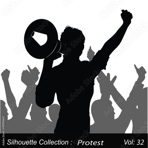 A Demonstrator Shouting Protests Through His Megaphone