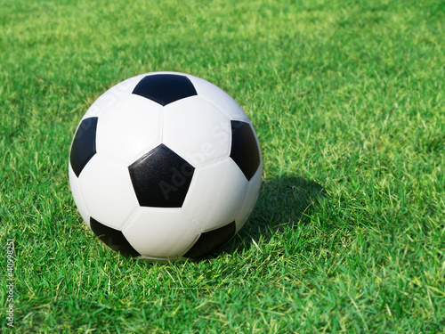 soccer ball on green grass © luckypic