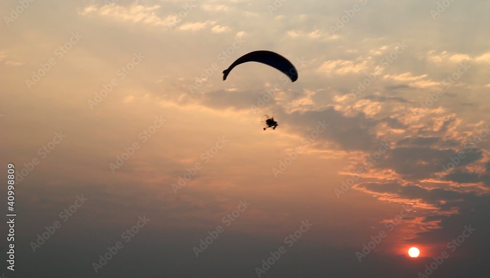 paraglider activity fly with beautiful sunset background paraglider activity fly with beautiful sunset background