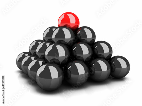 Pyramid of black spheres an...