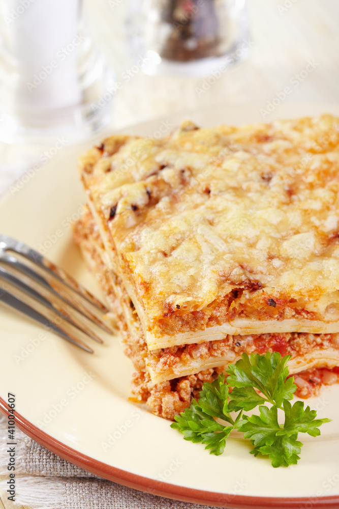 Italian cuisine. Meat lasagna on the served table Italian cuisine. Meat lasagna on the served table