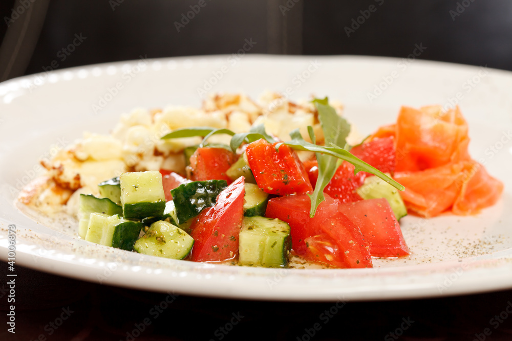 Scrambled eggs with salmon and vegetables Scrambled eggs with salmon and vegetables