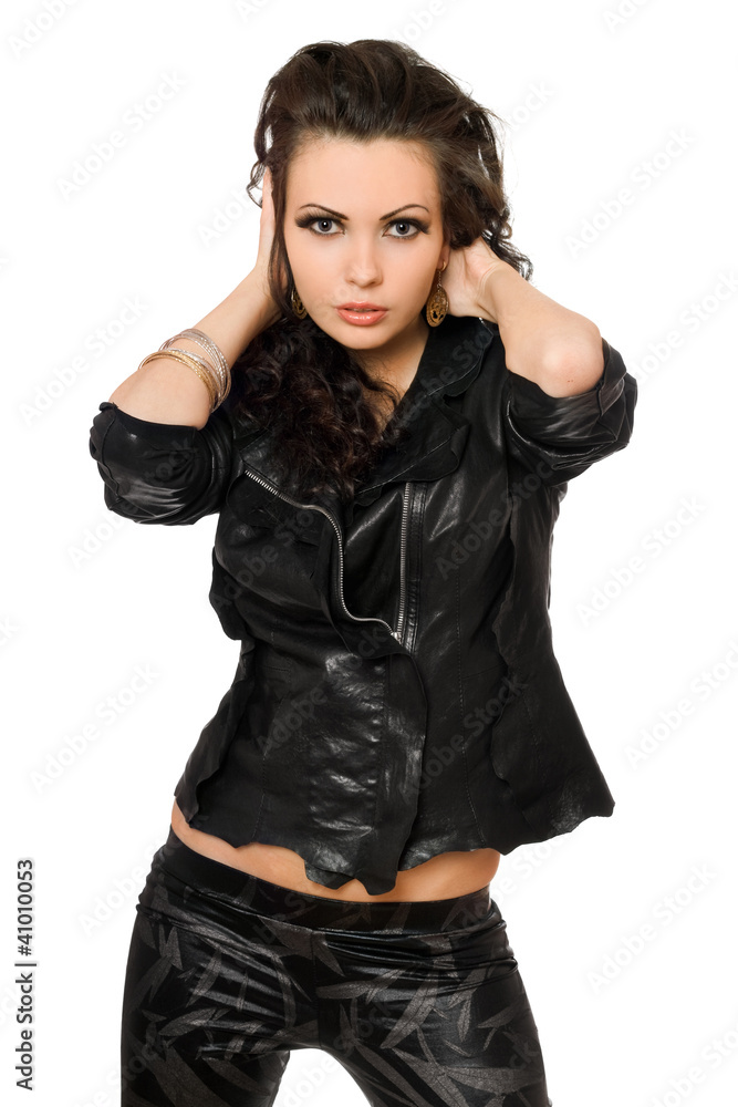 Portrait of gorgeous young brunette in black clothes. Isolated Portrait of gorgeous young brunette in black clothes. Isolated