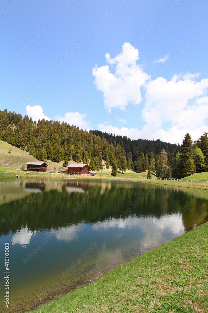 meadows and lakes of Dolomites Alps, Italy