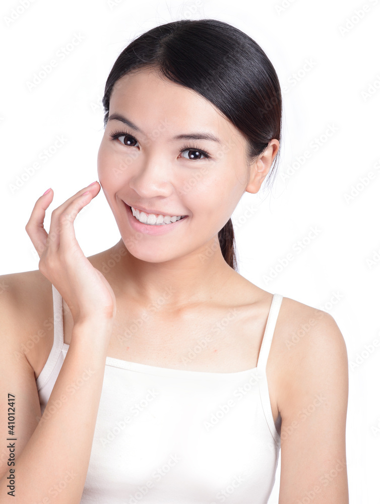 Young Girl Smile touch face with health skincare Young Girl Smile touch face with health skincare