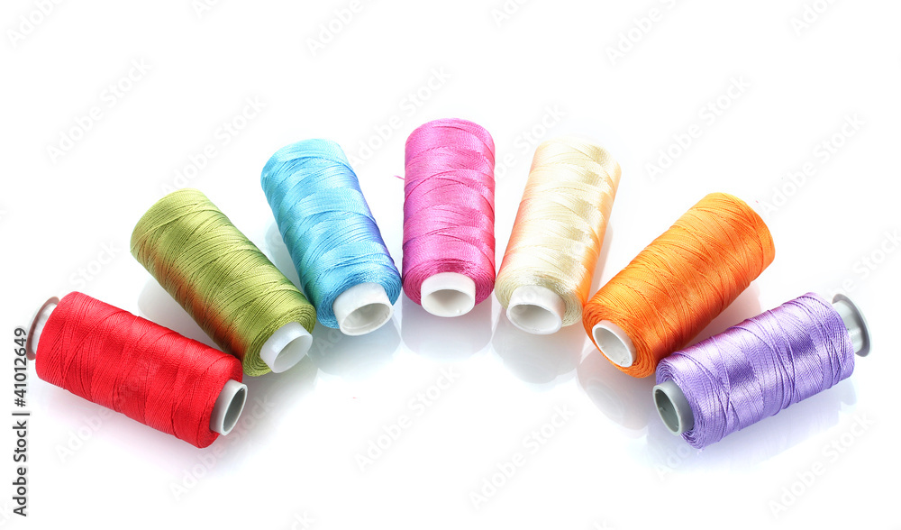bright bobbin thread isolated on white. bright bobbin thread isolated on white.