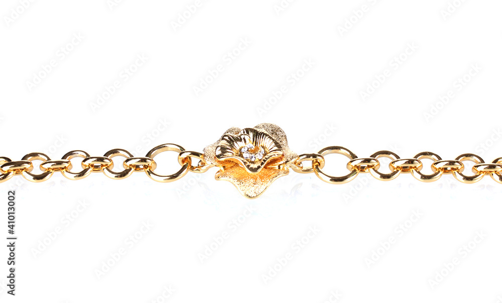 Beautiful golden bracelet with precious stones isolated on white Beautiful golden bracelet with precious stones isolated on white