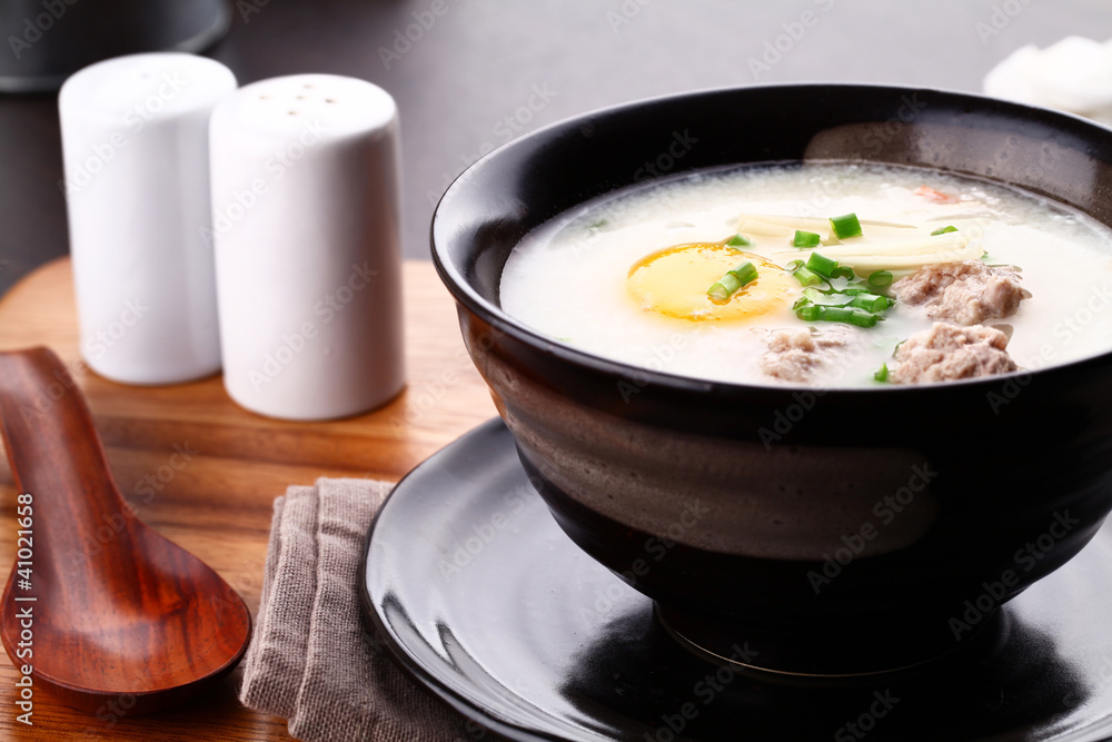 Traditional chinese porridge rice gruel in bowl, congee. Traditional chinese porridge rice gruel in bowl, congee.