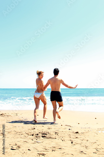 beautiful couple posing on the sea coast © Netfalls