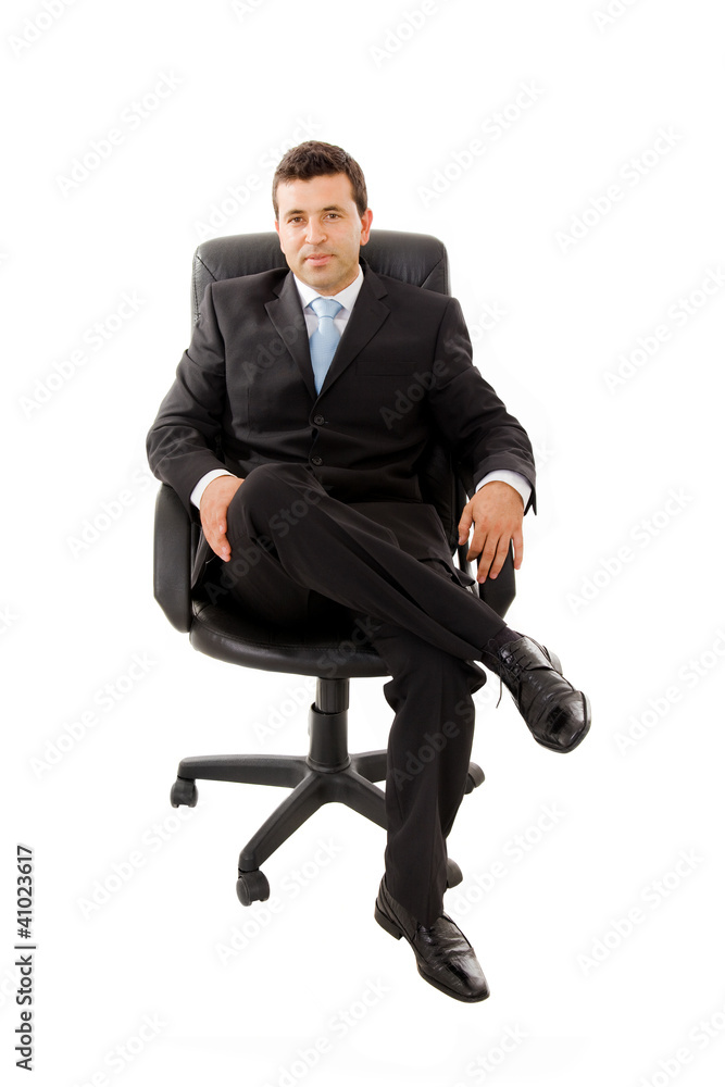 Young business man sitting in a chair and relaxing, isolated on Young business man sitting in a chair and relaxing, isolated on