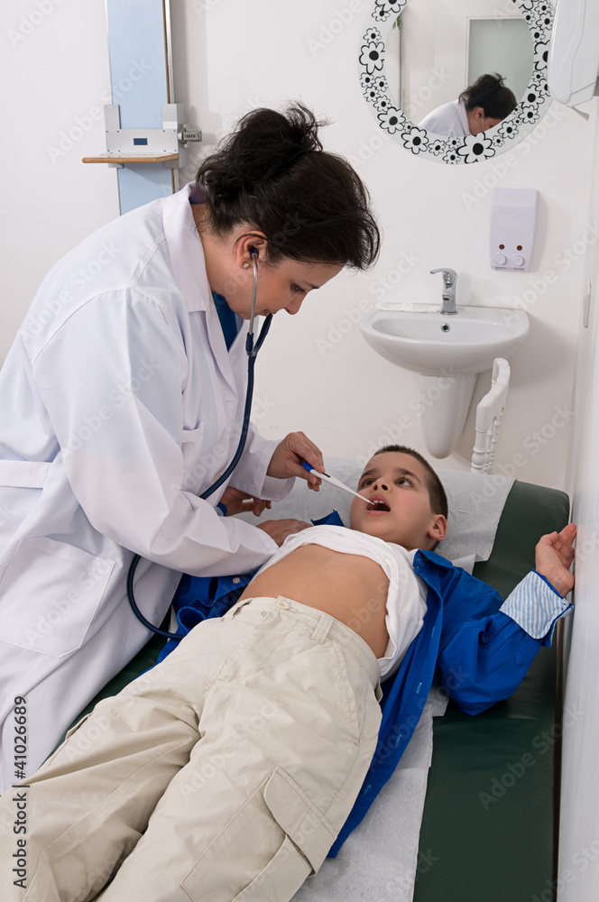 Doctor checking fever of a child at hospital Doctor checking fever of a child at hospital