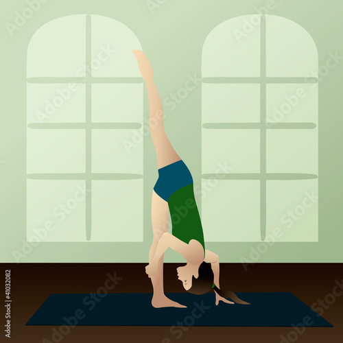 Young woman practicing yoga photo