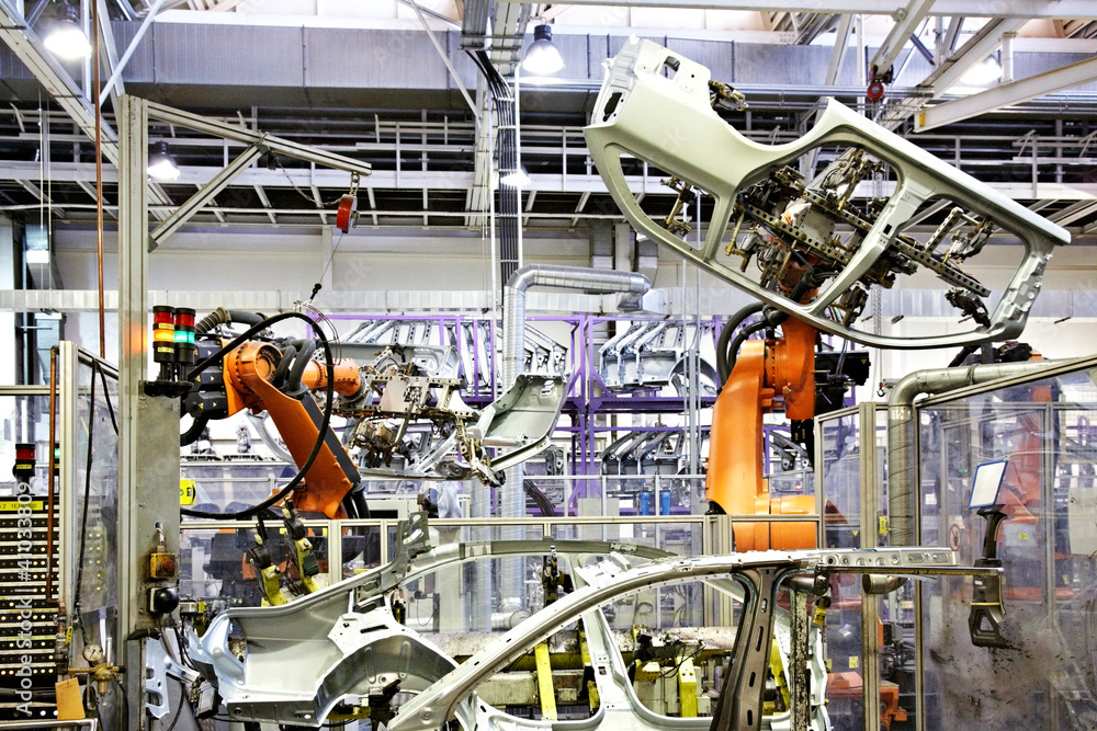 robots in a car factory - obrazy, fototapety, plakaty 