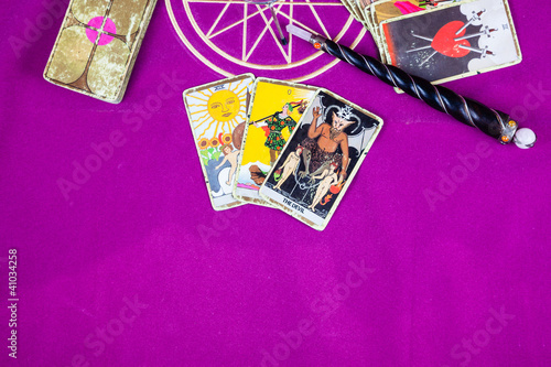 Tarot cards with a magic wand.