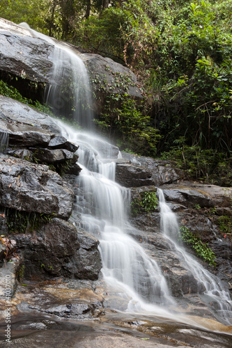 Fototapeta Naklejka Na Ścianę i Meble -  beautiful waterfall in the National Park  valley in the mountain
