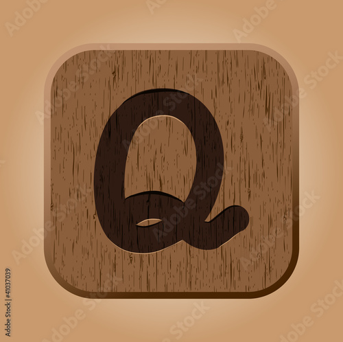 Hand drawn  wooden letter Q.