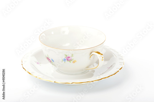 vintage cup and saucer on a white background