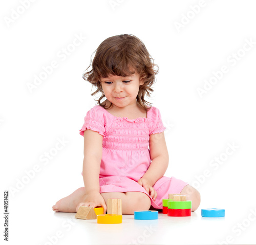 Funny little child playing ...