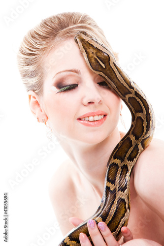 Beautiful woman holding python on isolated white