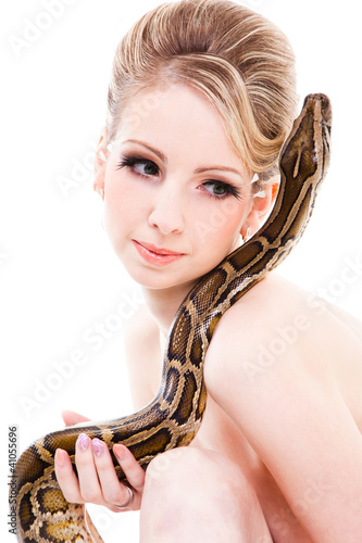 Beautiful woman holding Python on isolated white