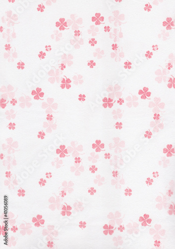 Red Clover leaves on white paper