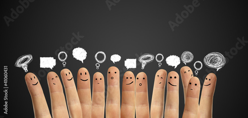 Happy group of finger smileys with peech bubbles photo