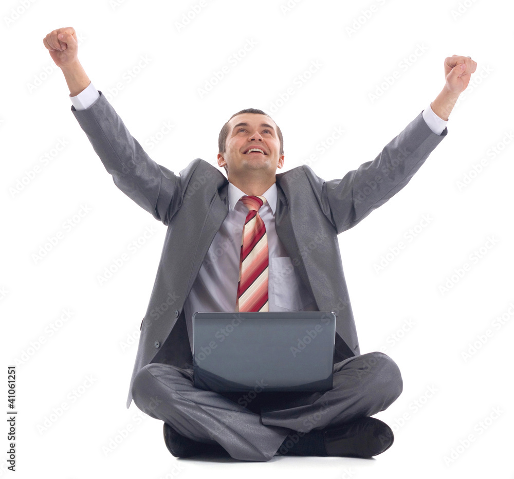 Business man celebrating his success with a computer laptop Business man celebrating his success with a computer laptop