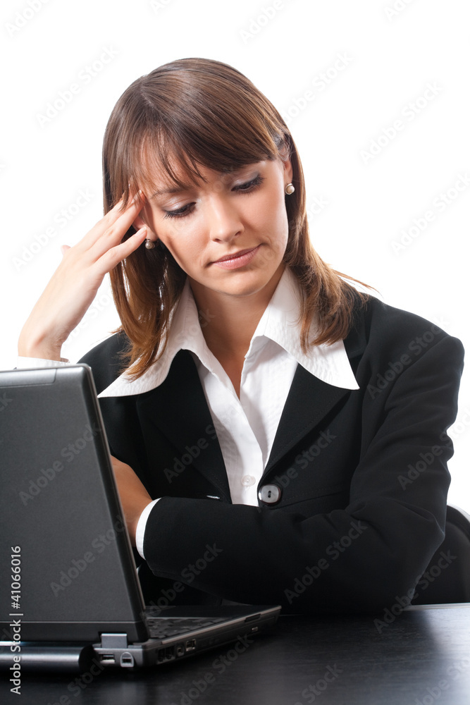 Serious thinking businesswoman with laptop, isolated on white Serious thinking businesswoman with laptop, isolated on white