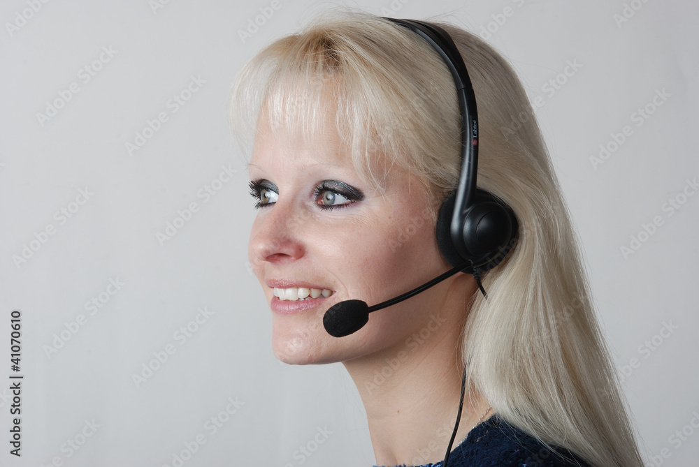 Portrait of young woman with headset Portrait of young woman with headset