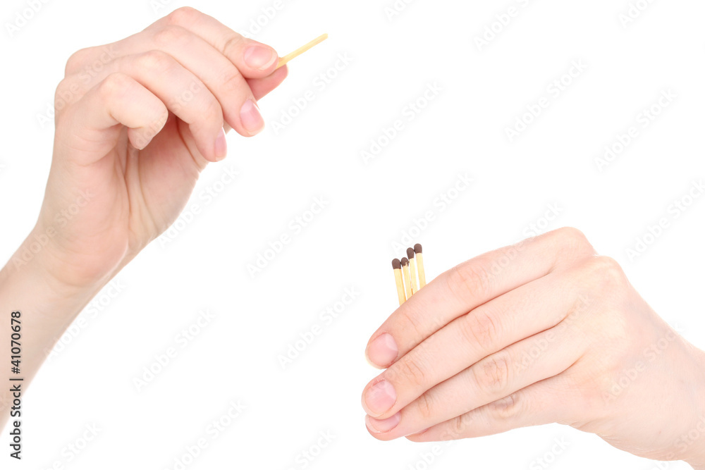 Hand throwing match isolated on white Hand throwing match isolated on white
